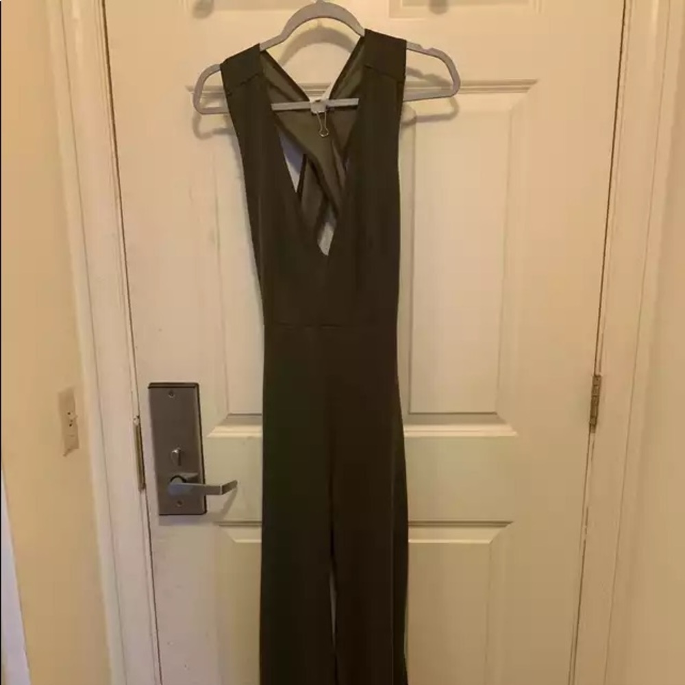 Olive green tailored jumpsuit with strappy details